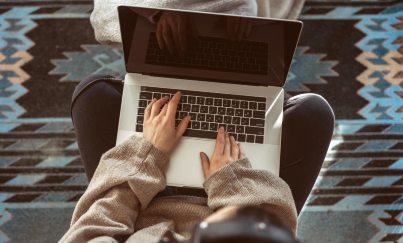 Instructor reviewing smart contract code with students during practical training session